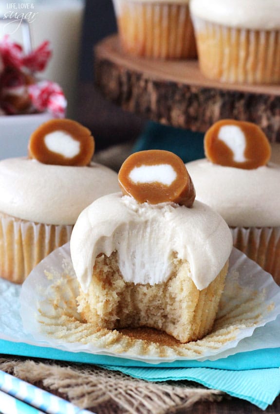 Caramel Cream Cupcakes with a bite out of one