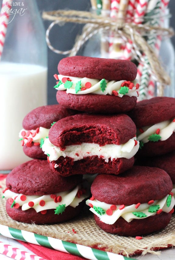 Red Velvet Cookie Sandwiches stacked on burlap