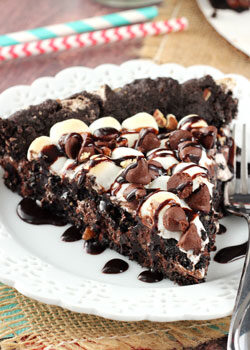 Rocky Road Cookie Cake slice on white plate