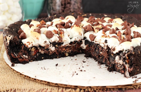 Rocky Road Cookie Cake with a couple slices removed