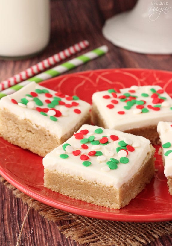 Christmas Frosted Sugar Cookie Bars on a plate