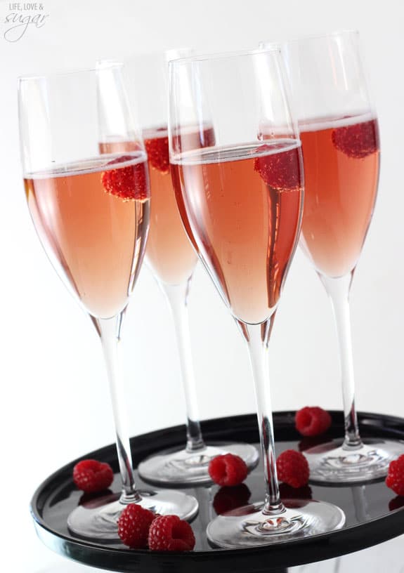 Four Black Raspberry Champagne Bellinis