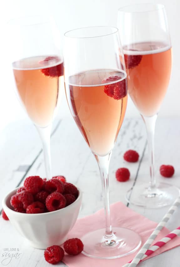 Three Black Raspberry Champagne Bellinis