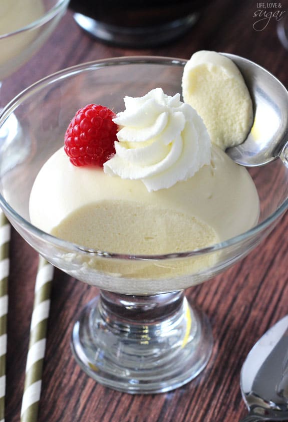 Close up of Champagne Mousse in a glass with a spoon taking out a scoop