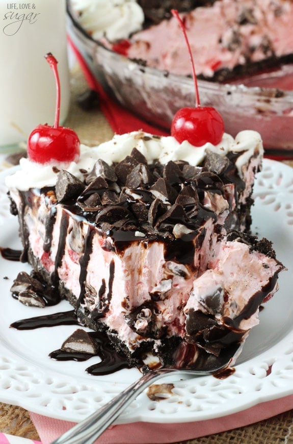 Chocolate Cherry Ice Cream Pie slice on a plate with a bite on a fork