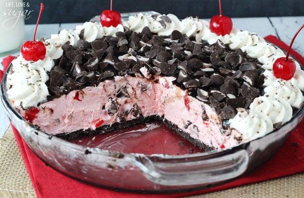 Chocolate Cherry Ice Cream Pie in a pie plate with a couple slices removed