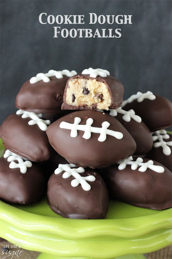 Eggless Chocolate Chip Cookie Dough Footballs on a green cake stand