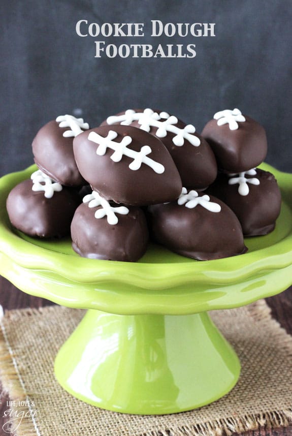 Eggless Chocolate Chip Cookie Dough Footballs on a green cake stand