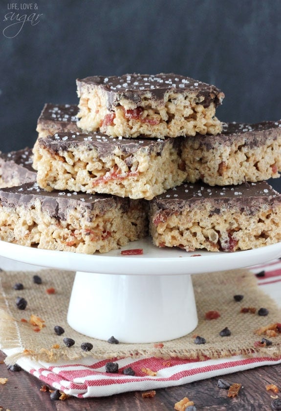 Maple Bacon Rice Krispie Treats on a cake stand