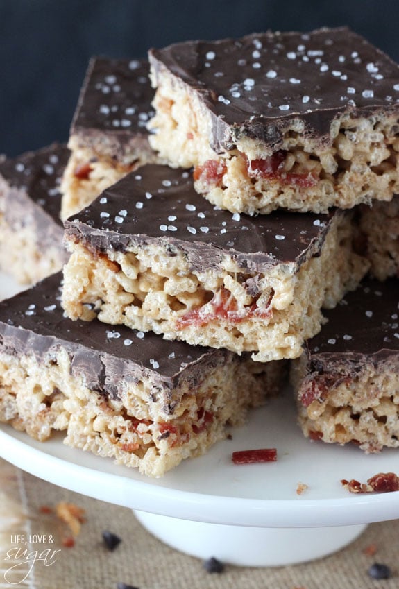 Maple Bacon Rice Krispie Treats on a cake stand