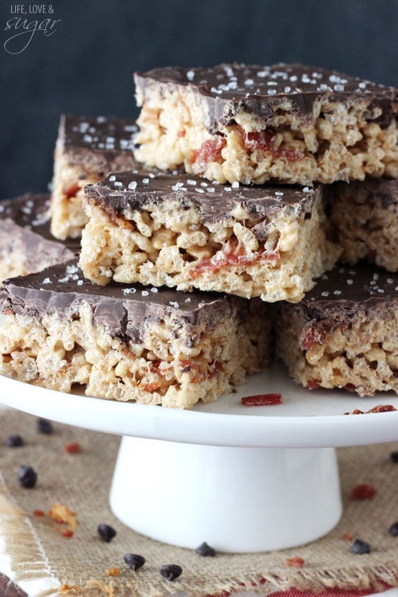 Maple Bacon Rice Krispie Treats on a cake stand