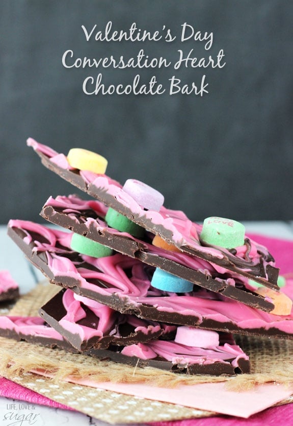 Conversation Heart Chocolate Bark stacked on burlap