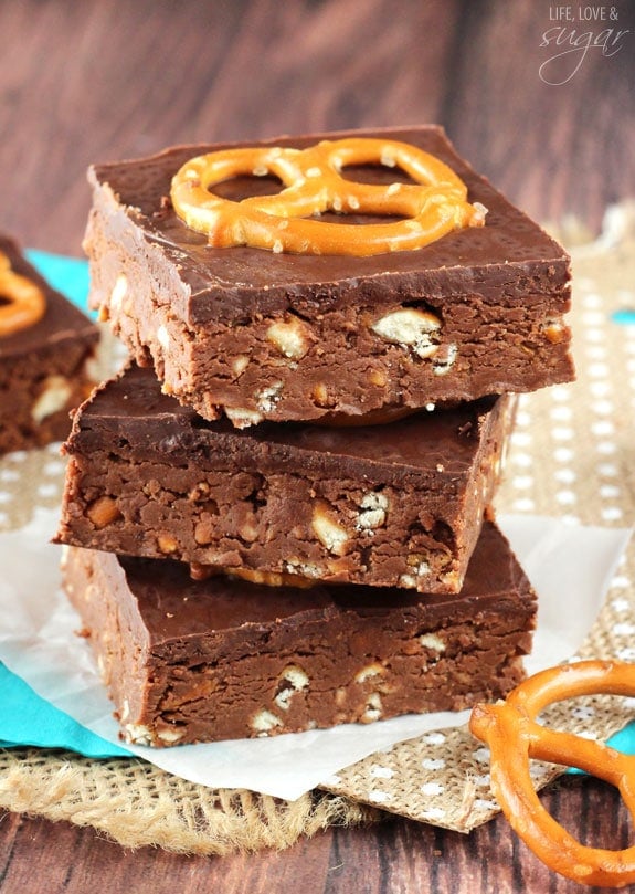 No Bake Nutella Pretzel Bars stacked on burlap