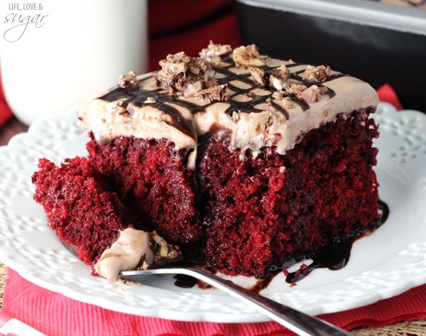 Nutella Red Velvet Poke Cake slice on a plate
