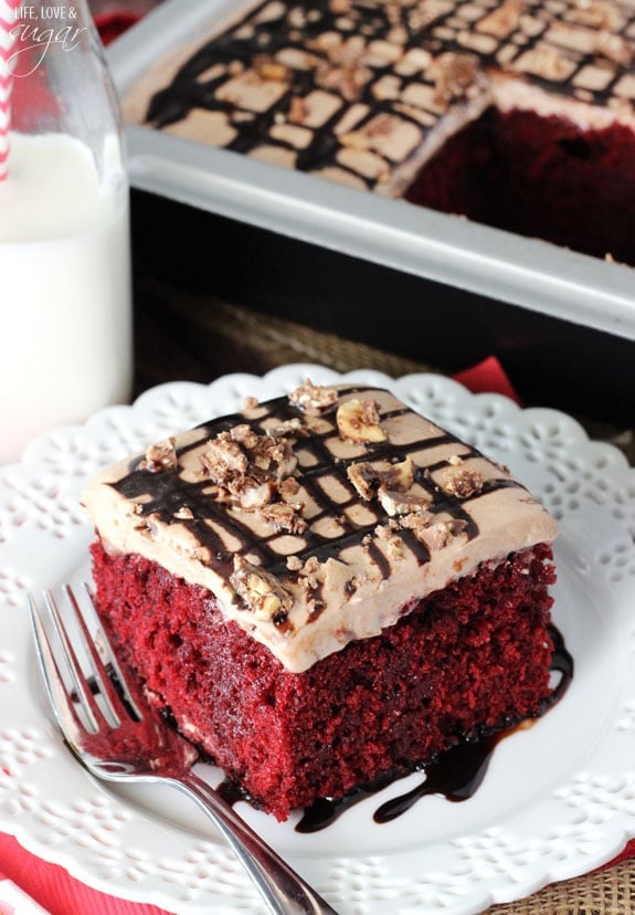 Nutella Red Velvet Poke Cake slice on a plate