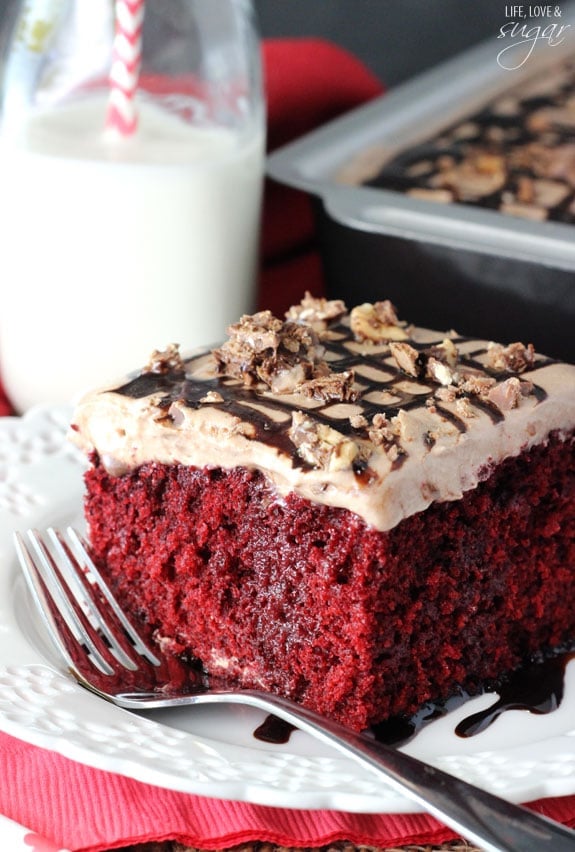 Nutella Red Velvet Poke Cake slice on a plate