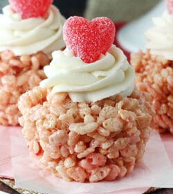 A Valentine's Day Rice Krispie Treat Cupcake on a pink napkin
