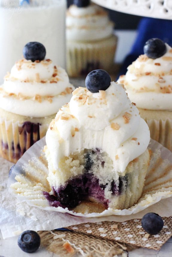 Blueberry Coconut Cupcakes with a bite out of one