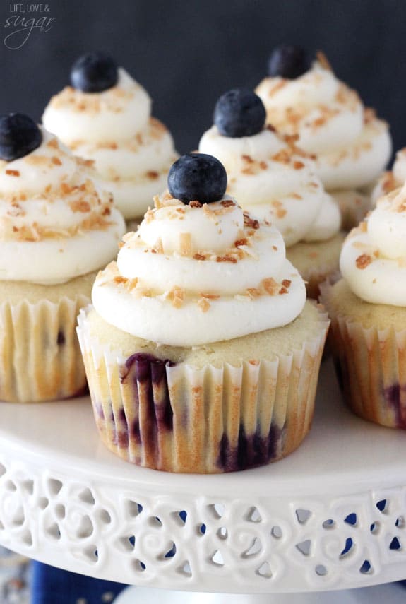 Blueberry Coconut Cupcakes on a cake stand