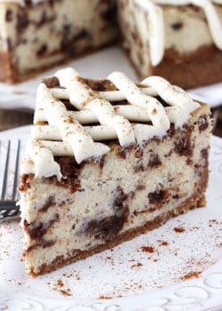 Cinnamon Roll Cheesecake slice on white plate