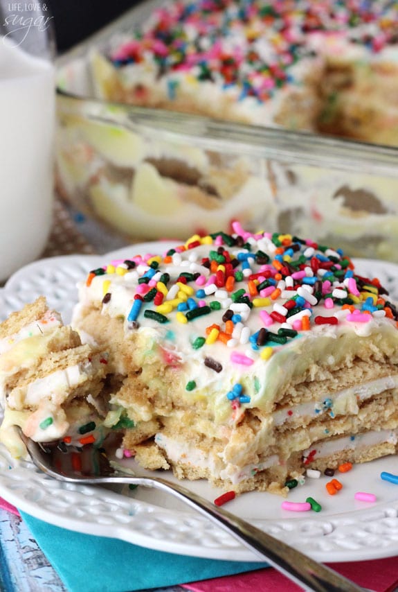 Funfetti Birthday Cake Icebox Cake slice on a plate with a fork