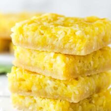 stack of four pineapple coconut bars close up