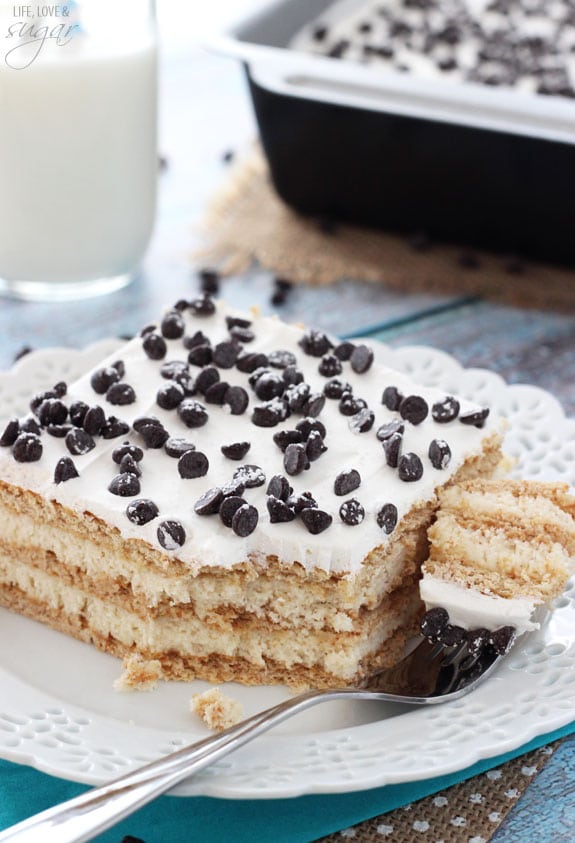 Cannoli Icebox Cake slice on a plate with a bite on a fork