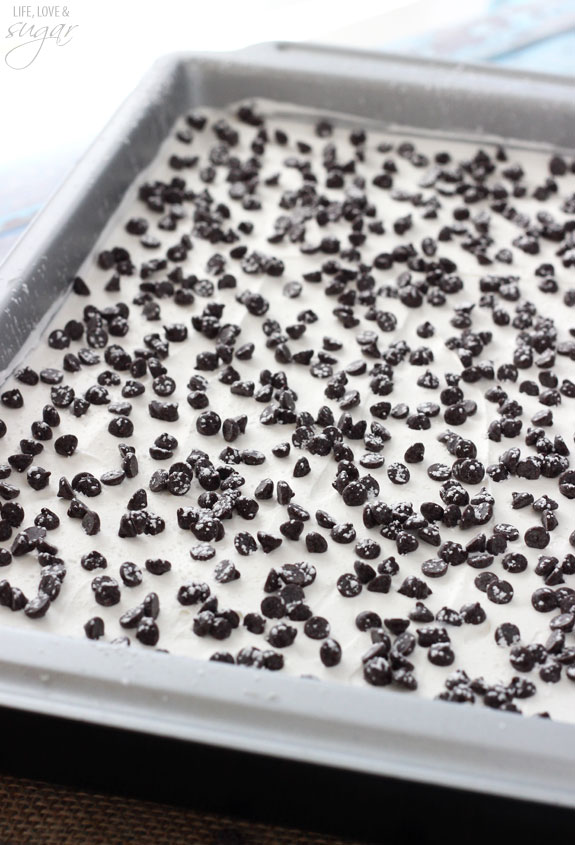 Cannoli Icebox Cake in a 9x13 pan topped with chocolate chips