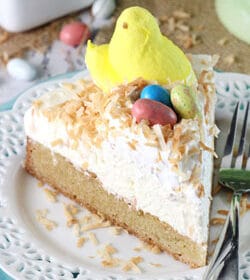 Coconut Blondie Cheesecake slice on white plate