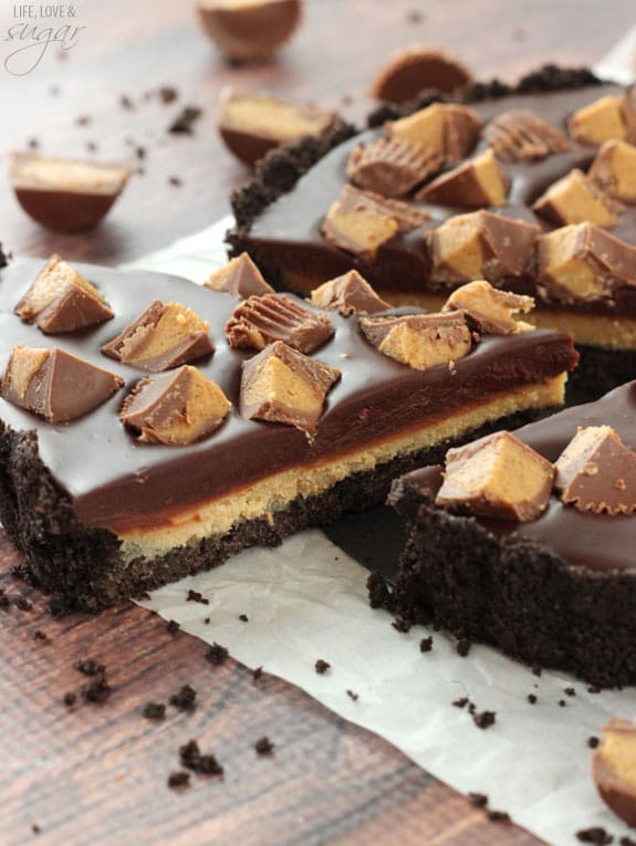 A slice being lifted from a Reeses Chocolate Peanut Butter Tart