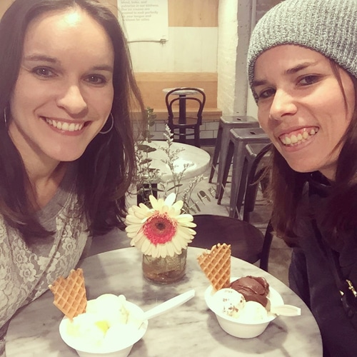Two food bloggers having dessert at a restaurant