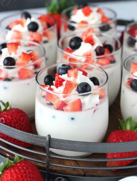 Panna Cotta with Fresh Berries on wooden/metal tray