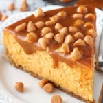 Loaded Butterscotch Cheesecake slice on white plate