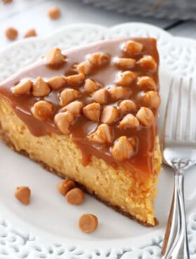 Loaded Butterscotch Cheesecake slice on white plate