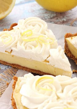 Creamy Lemon Tart with slice being removed close up