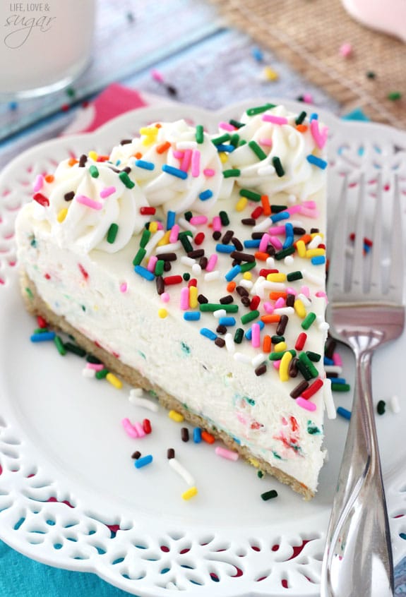 No Bake Funfetti Cheesecake! Golden Birthday Cake Oreo Crust filled with cake batter sprinkle cheesecake! So good!