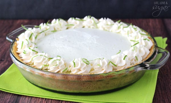 A whole No Bake Margarita Pie in a pie dish on a green placemat