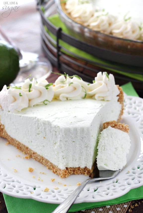 No Bake Margarita Pie slice on a plate with a bite on a fork