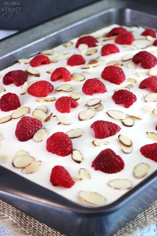 Raspberry Almond Poke Cake in a 9x13 pan