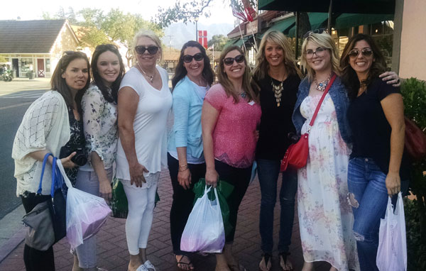 Eight Food Bloggers posing together in Santa Barbara