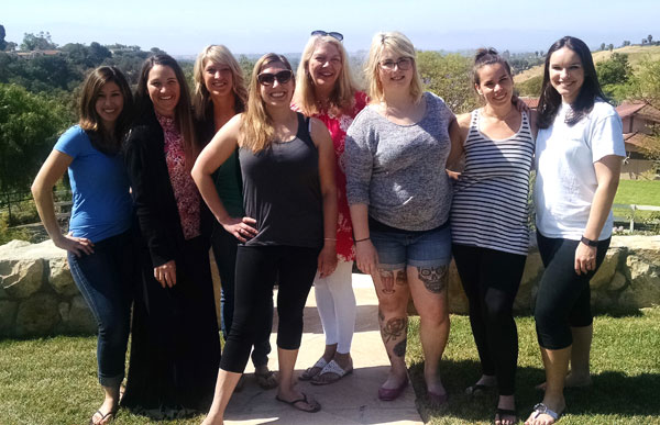 Eight Food-Loving Bloggers Posing Together Outside Opryland Estate