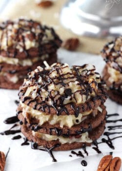 A close up of a German Chocolate Cookie Stack that has been drizzled with chocolate sauce