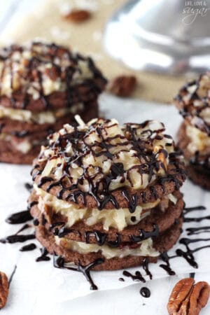 A close up of a German Chocolate Cookie Stack that has been drizzled with chocolate sauce