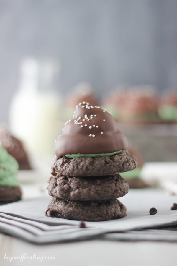 Mint Chip Hi Hat Cookie stacked on top of chocolate cookies