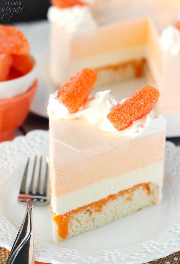 Orange Creamsicle Ice Cream Cake slice on a plate