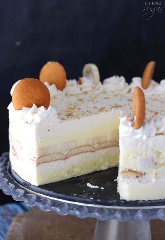 Banana Pudding Icebox Cake on a cake stand with a slice removed