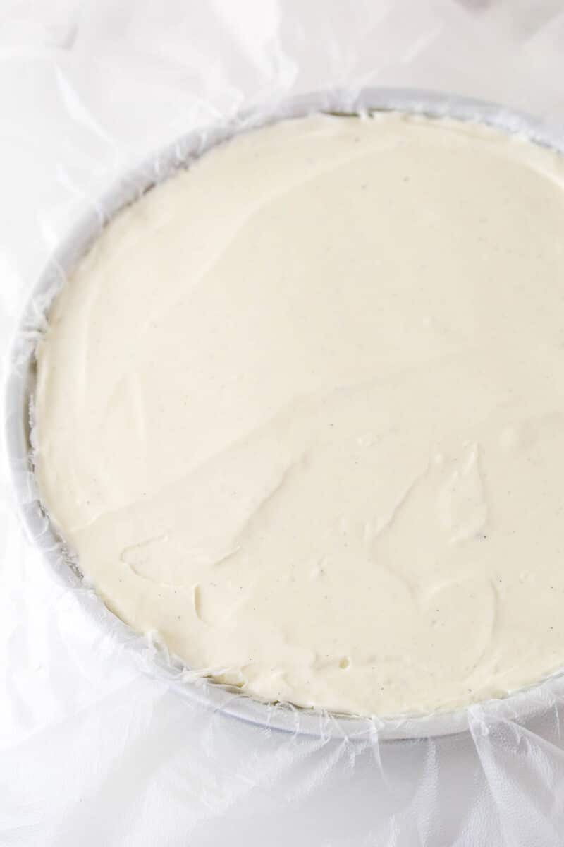 Vanilla ice cream spread in a round pan