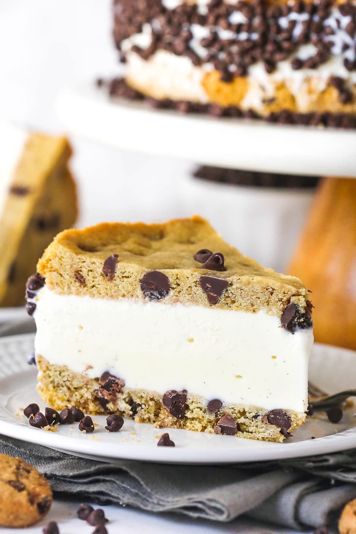 A slice of chocolate chip cookie ice cream cake on a plate