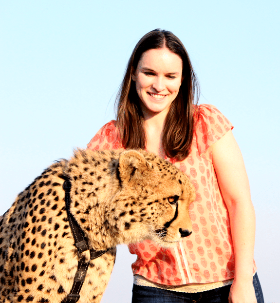 Lindsay Looking at a Cheetah with a Collar on it