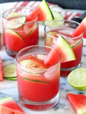 Three Watermelon Elderflower Cocktails Garnished with Watermelon Slices